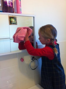 kids cleaning the bathroom